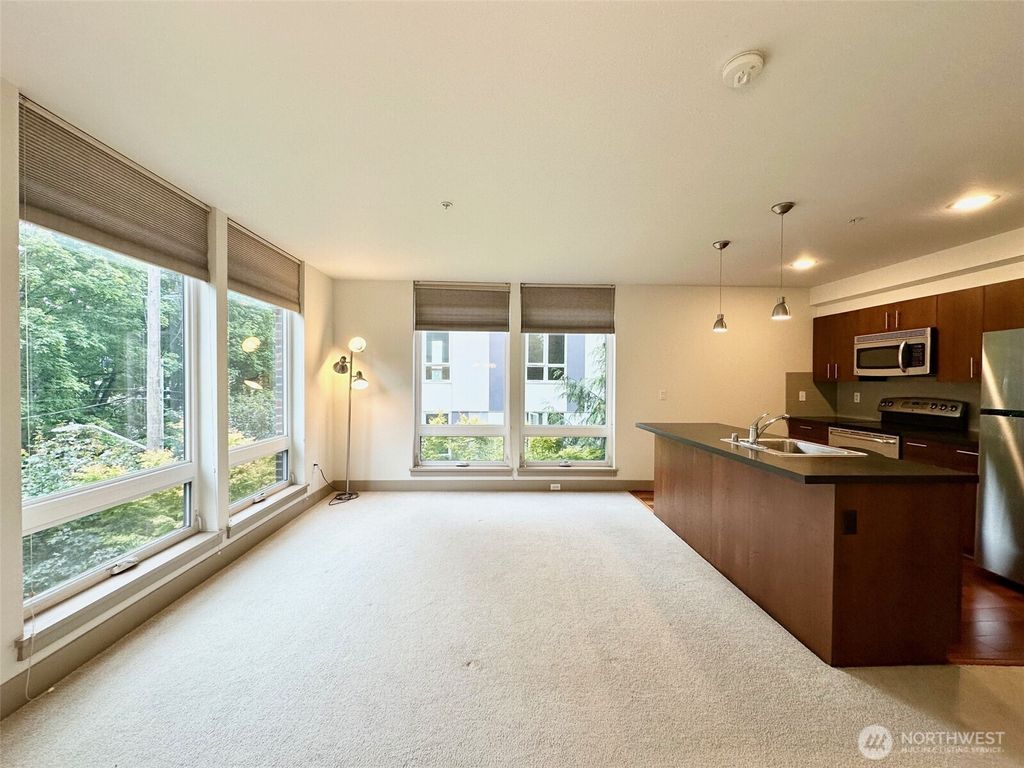 Photo of 4547 8th Ave NE Ave #306, Seattle, WA 98105 (MLS # 2437359)