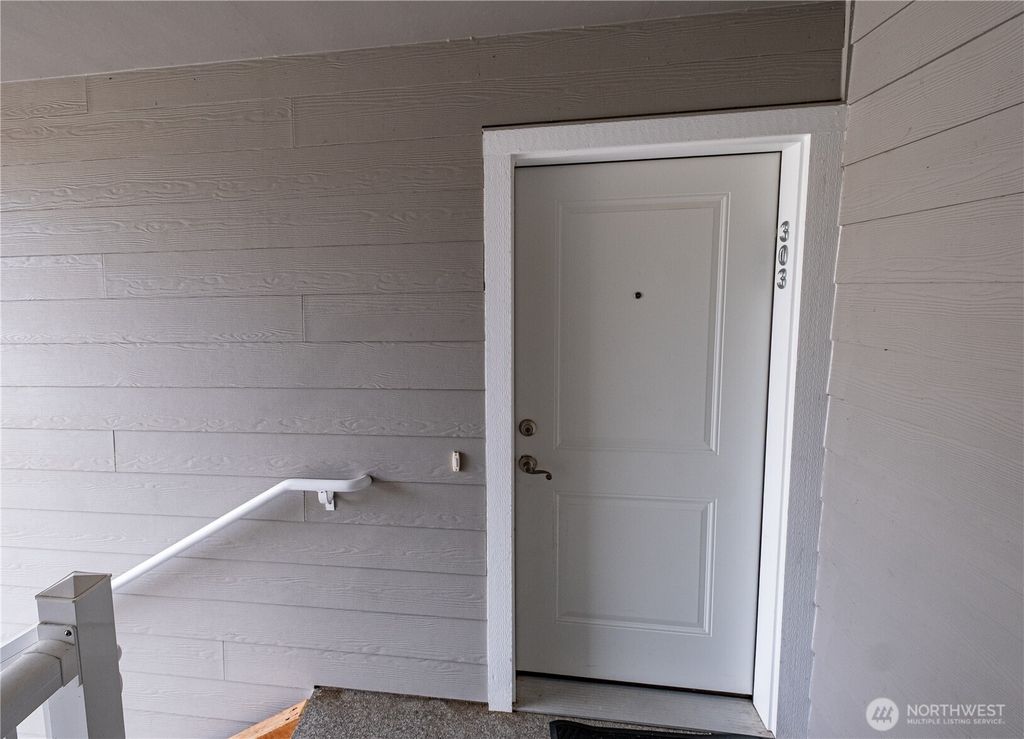 Photo of 1651 SW Mulberry Pl #E303, Oak Harbor, WA 98277 (MLS # 2501709)