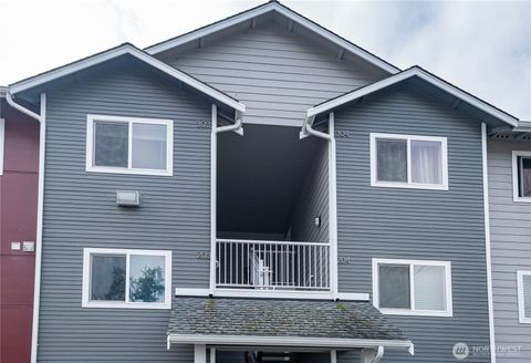 Photo of 1651 SW Mulberry Pl #E303, Oak Harbor, WA 98277 (MLS # 2501709)