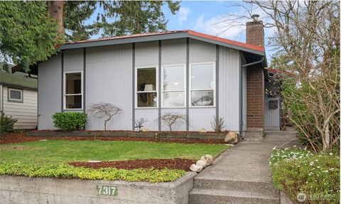 Photo of 7317 30th Avenue SW, Seattle, WA 98126 (MLS # 2483439)