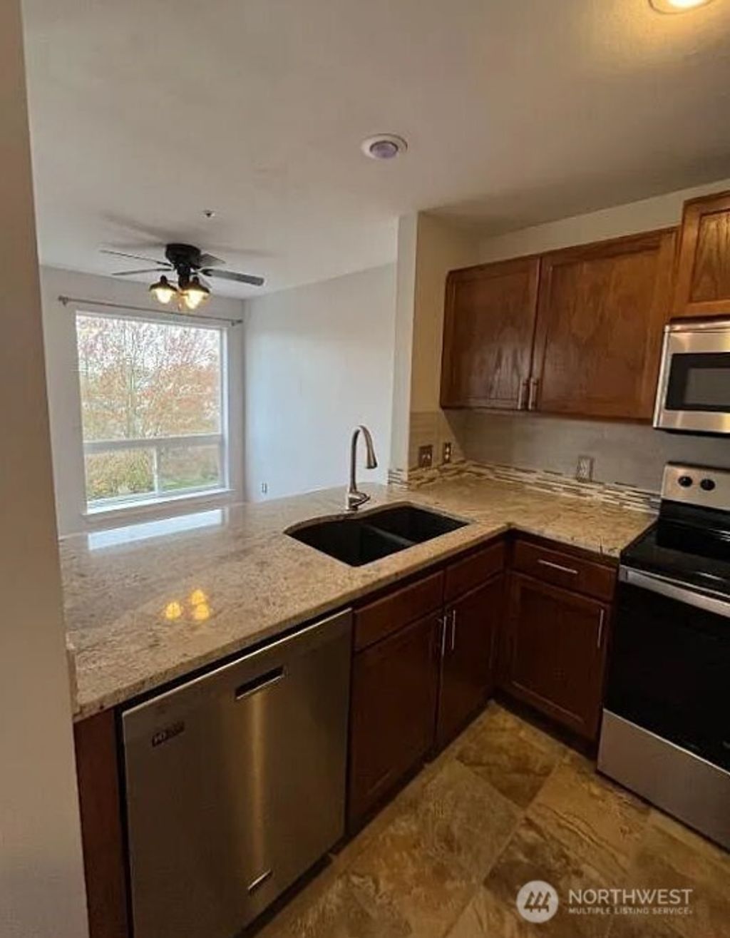 Photo of 9733 272nd Place NW #320, Stanwood, WA 98292 (MLS # 2526524)