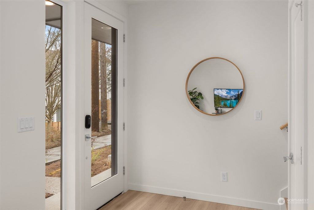 Photo of 8037 A Mary Avenue NW, Seattle, WA 98117 (MLS # 2052394)