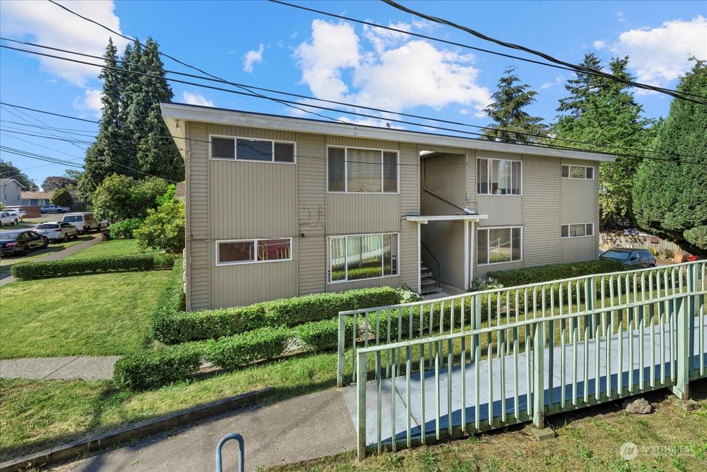 Photo of 9015 9th Avenue SW, Seattle, WA 98106 (MLS # 2256250)