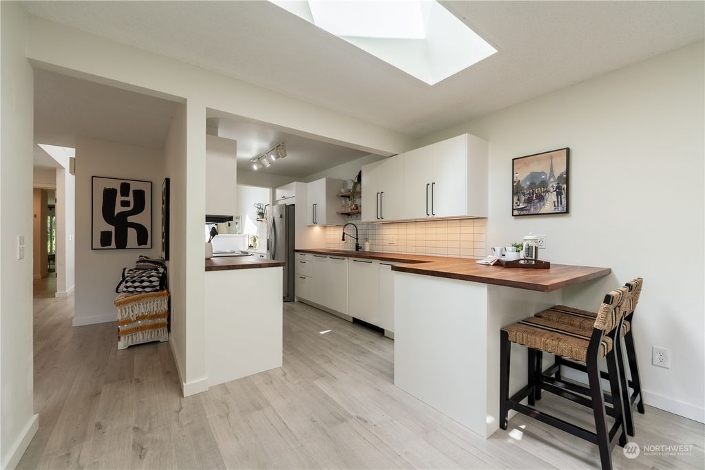 Photo of 215 142nd Place NE #57E, Bellevue, WA 98007 (MLS # 2250674)