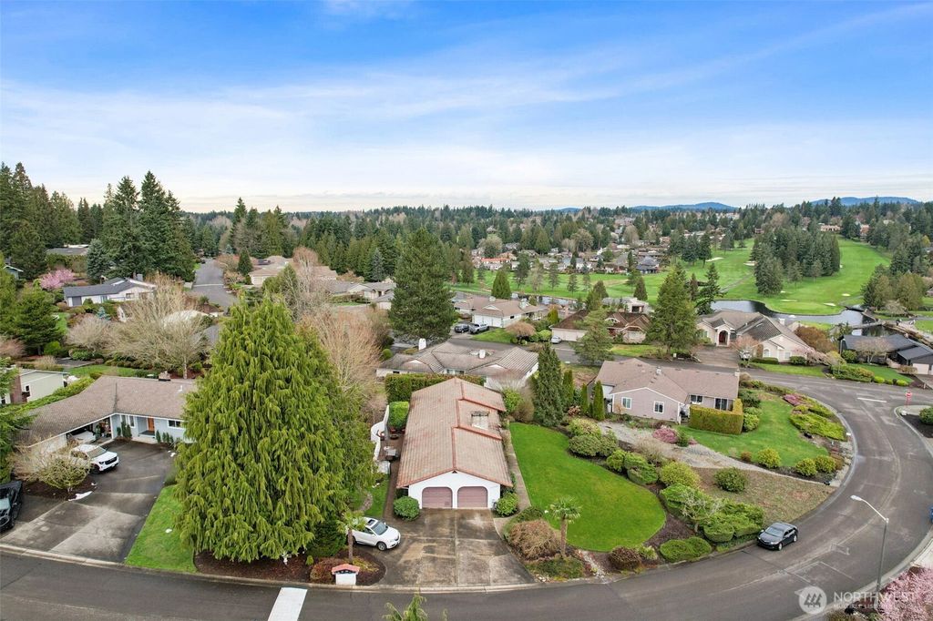 Photo of 13710 SE 251st Place, Kent, WA 98042 (MLS # 2493493)