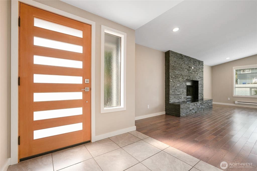 Photo of 10818 31st Avenue SW, Seattle, WA 98146 (MLS # 2546306)