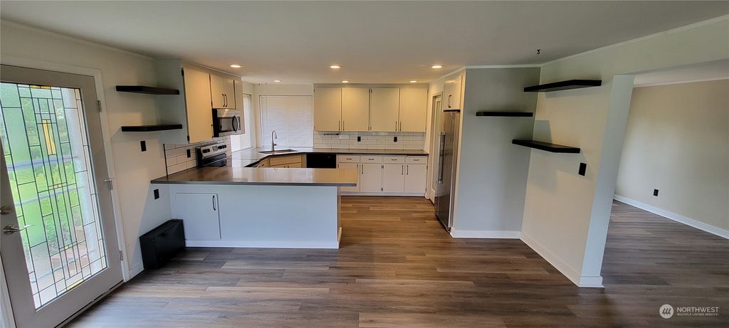 Photo of 129 2nd Avenue SW, Pacific, WA 98047 (MLS # 2242467)