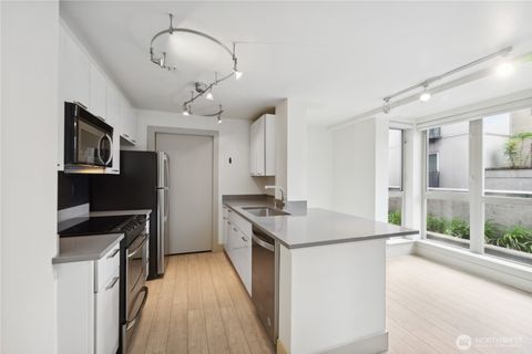 Photo of 1420 E Pine Street #E201, Seattle, WA 98122 (MLS # 2440733) Photo of 1420 E Pine Street #E201, Seattle, WA 98122 (MLS # 2440733)