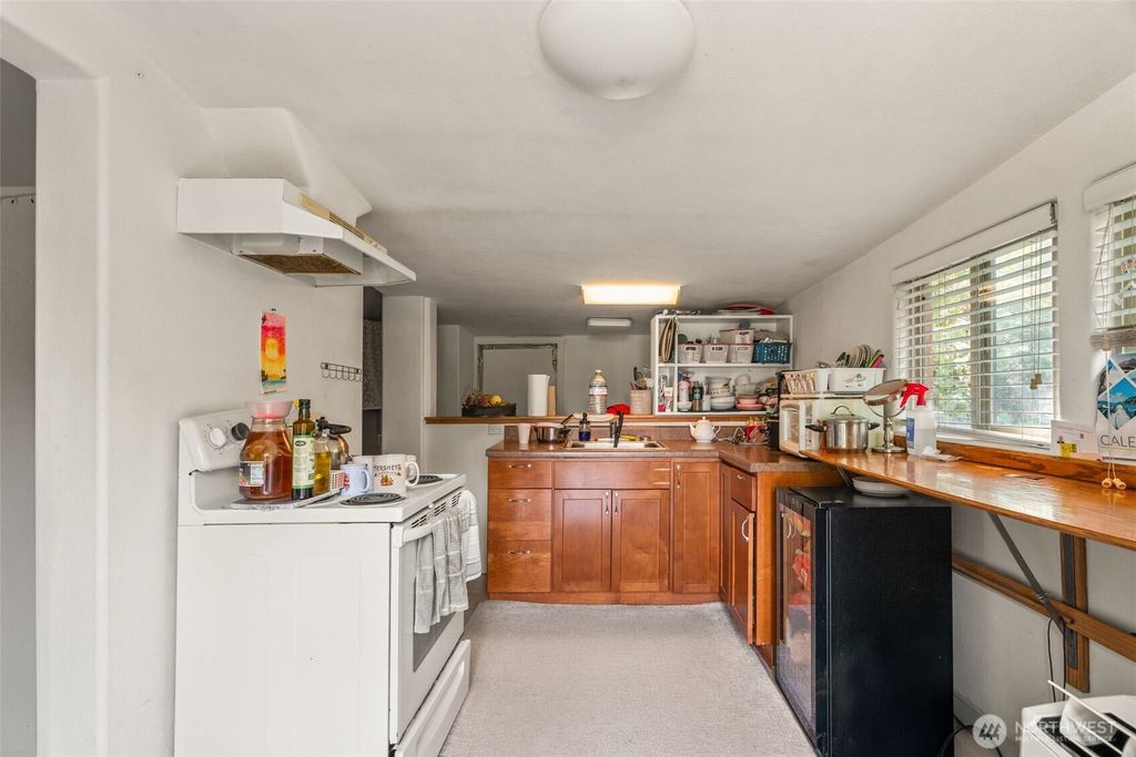 Photo of 8011 S 128th Street, Seattle, WA 98178 (MLS # 2424186)
