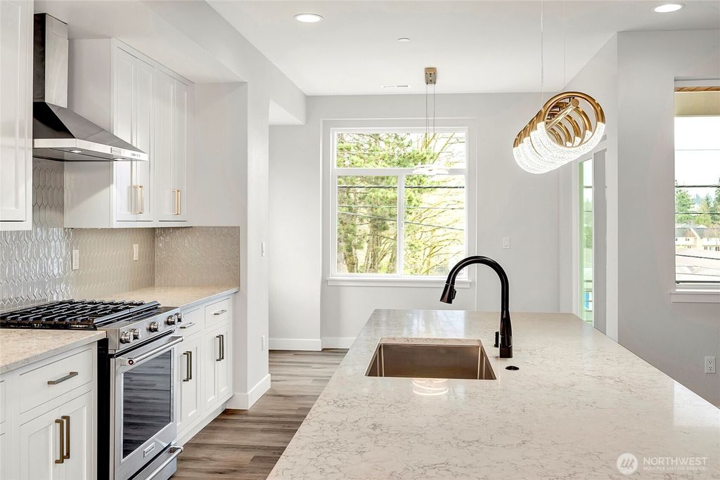 Photo of 6726 NE 187th Street #104, Kenmore, WA 98028 (MLS # 2379111)