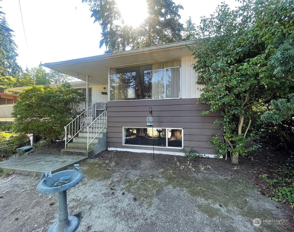 Photo of 11721 24th Avenue NE, Seattle, WA 98125 (MLS # 2042752)