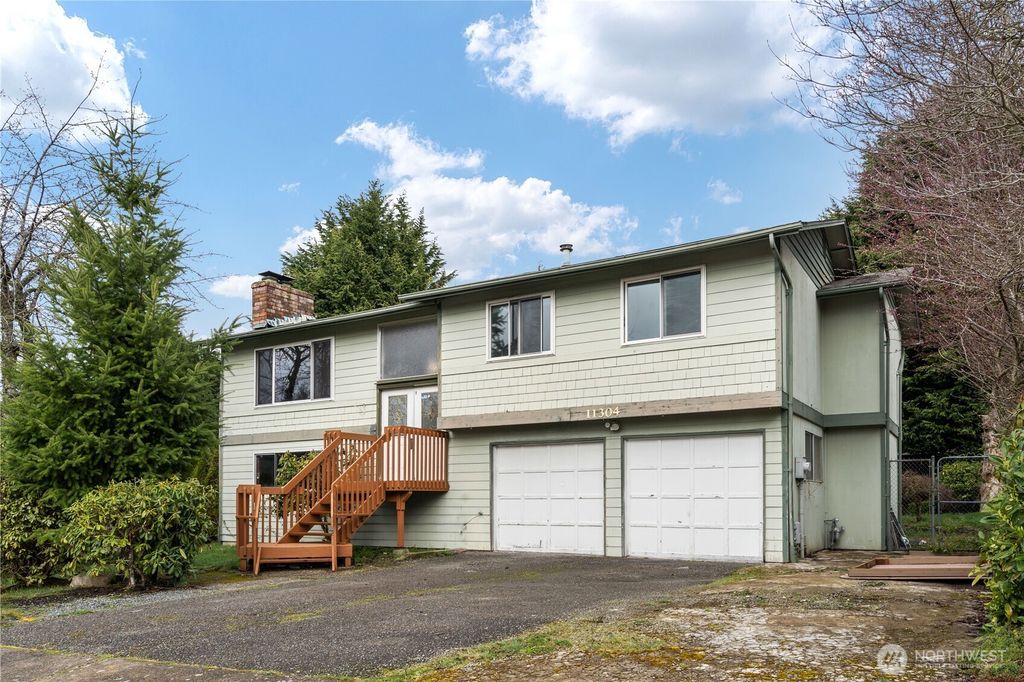 Photo of 11304 SE 218th Place, Kent, WA 98031 (MLS # 2341070)