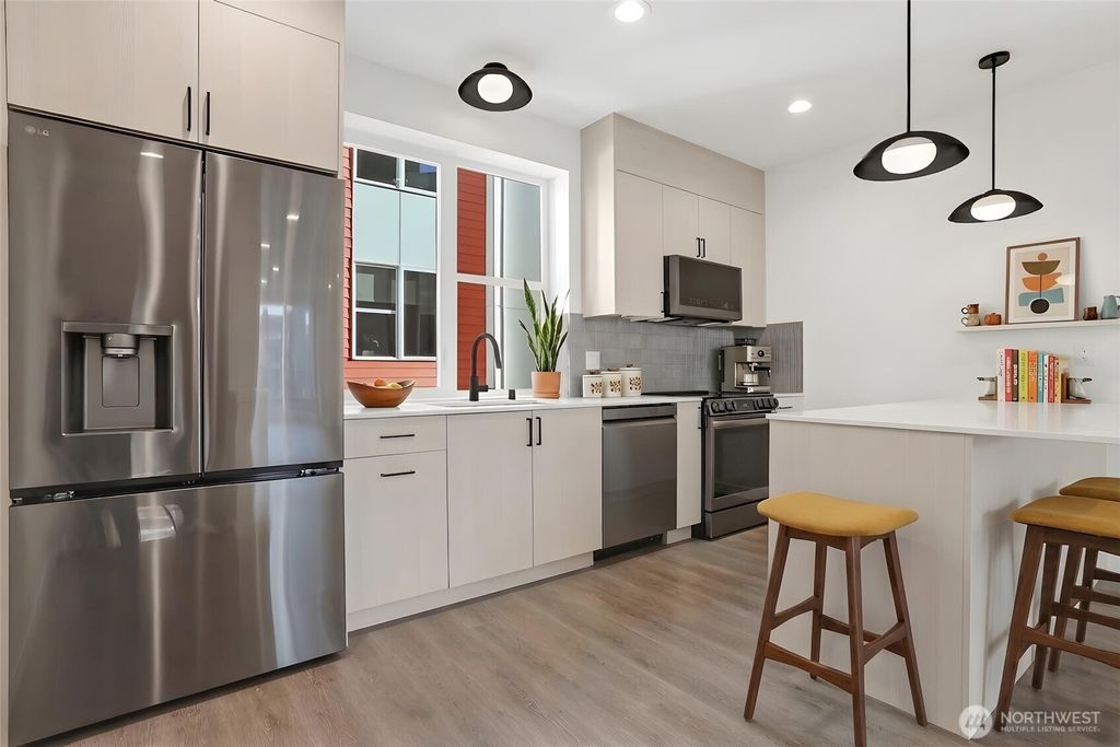 Photo of 9020 13th Avenue NW #B, Seattle, WA 98117 (MLS # 2497417)