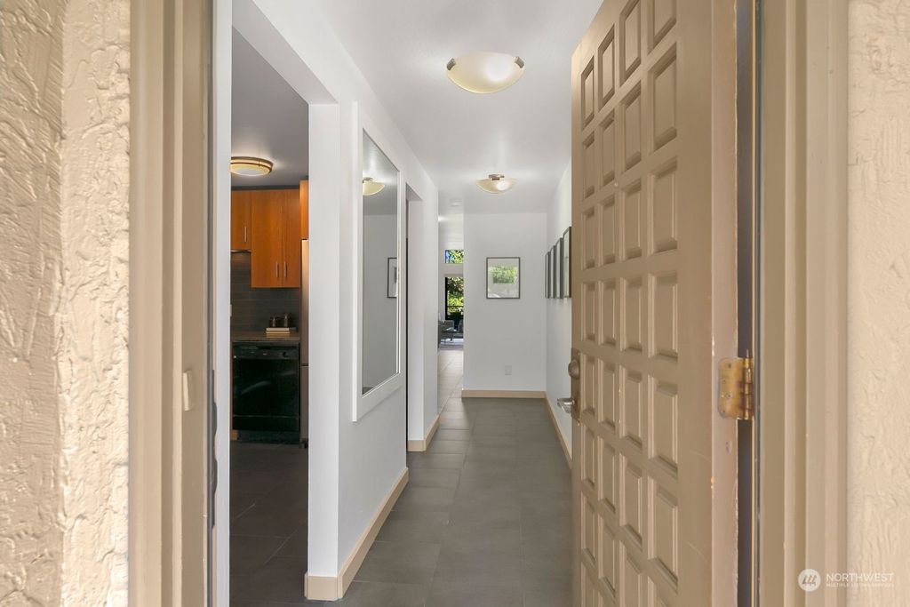 Photo of 6624 Parkpoint Way NE #D-205, Seattle, WA 98115 (MLS # 2282972)