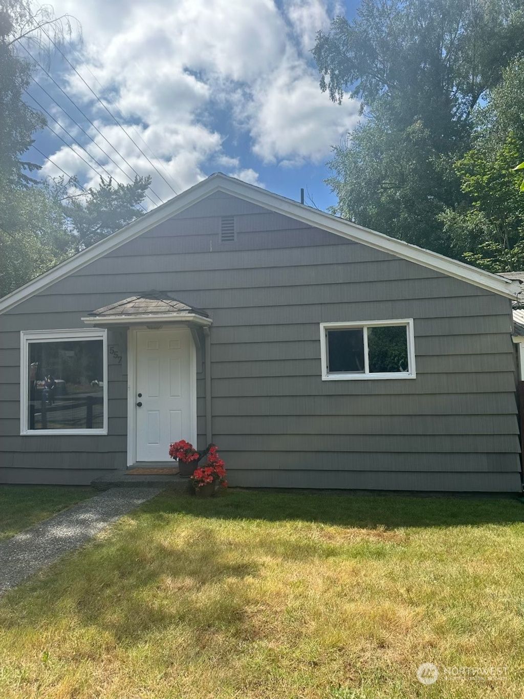 Photo of 557 NE 115th Street, Seattle, WA 98125 (MLS # 2262284)