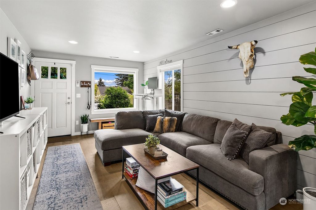 Photo of 8525 10th Avenue NW, Seattle, WA 98117 (MLS # 2239307)