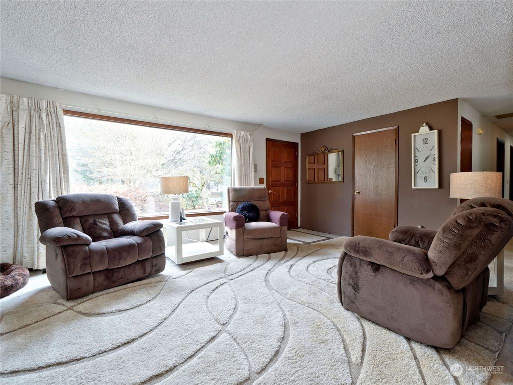 Photo of 415 Thrasher Avenue NE, North Bend, WA 98045 (MLS # 2198837)