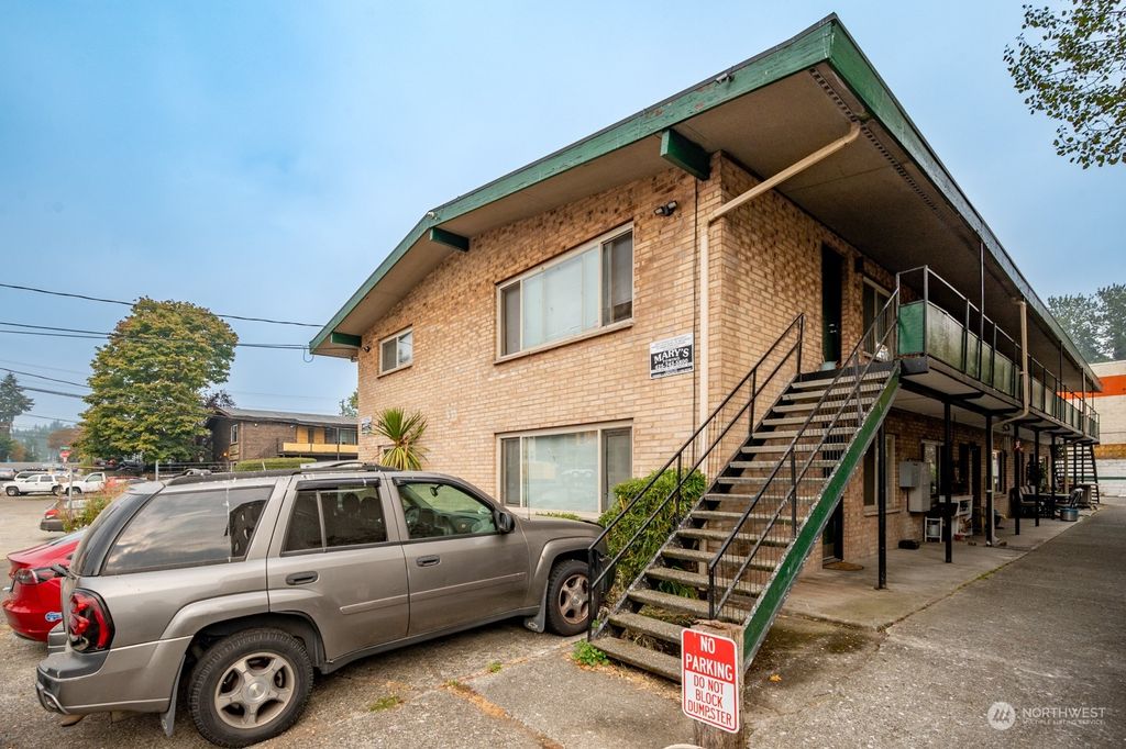 Photo of 14332 32nd Avenue NE #A-H, Seattle, WA 98125 (MLS # 2011546)