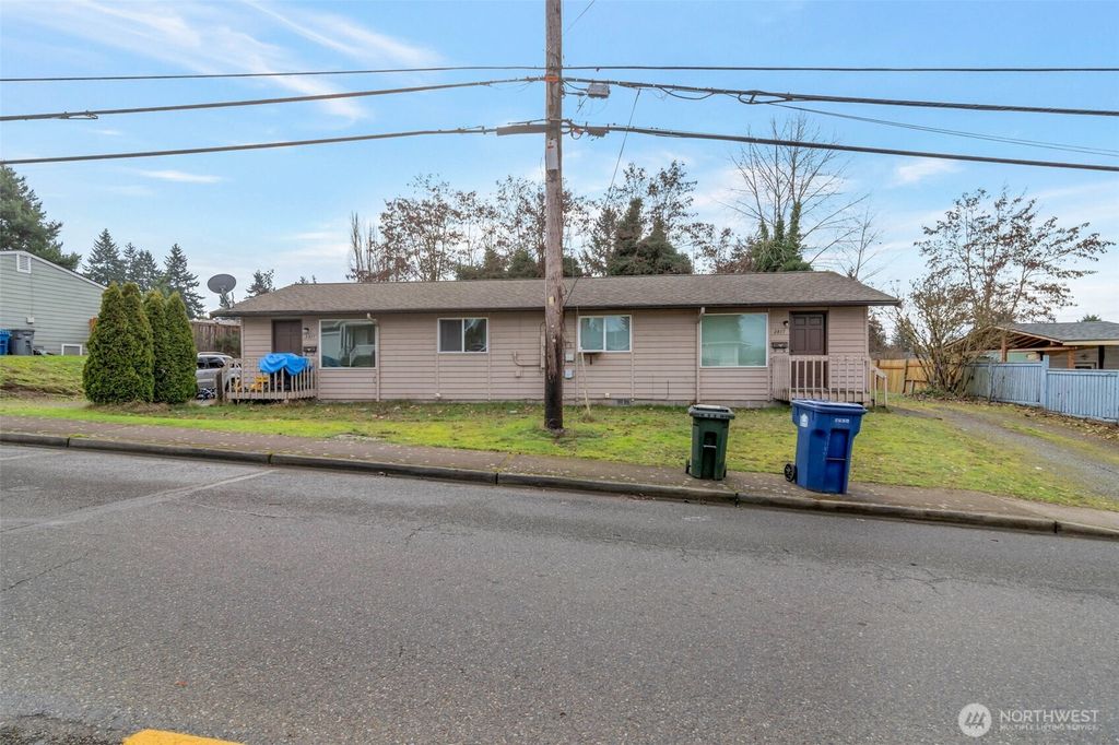 Photo of 2815 - 2817 NE 7th Street, Renton, WA 98056 (MLS # 2475989)