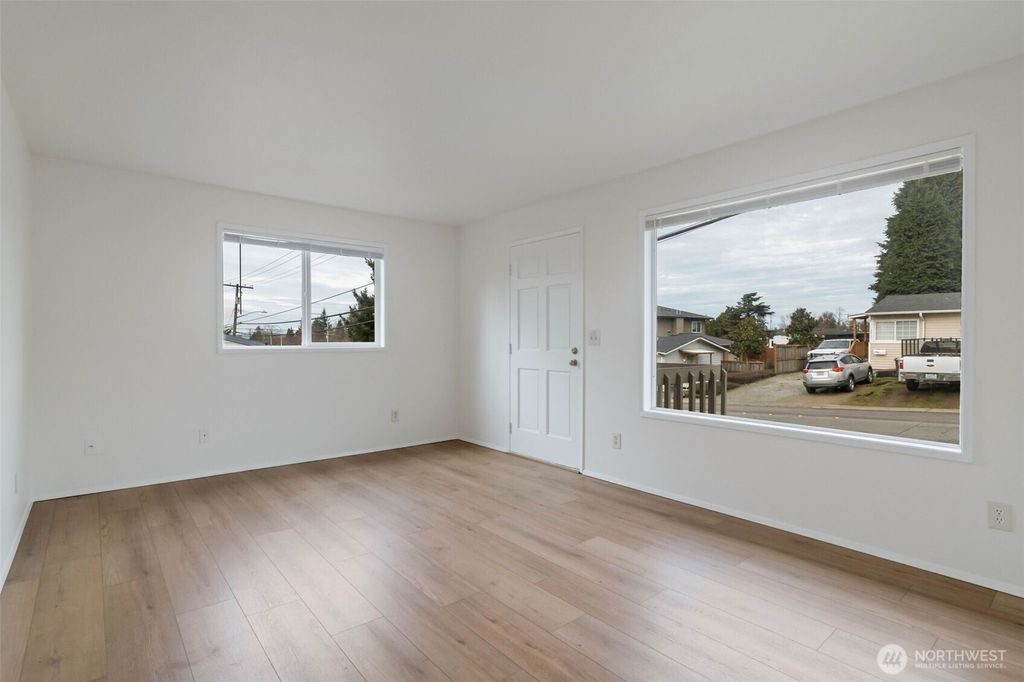 Photo of 2815 - 2817 NE 7th Street, Renton, WA 98056 (MLS # 2475989)