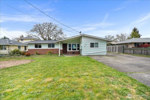 Photo of 125 E 60th Street, Tacoma, WA 98404 (MLS # 2514104)