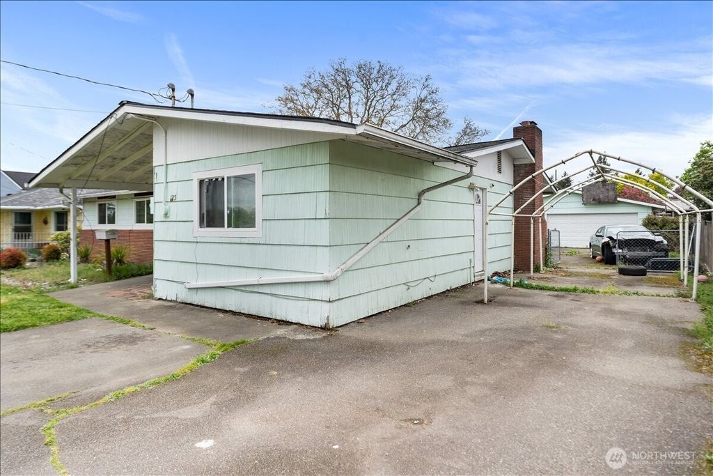 Photo of 125 E 60th Street, Tacoma, WA 98404 (MLS # 2514104)
