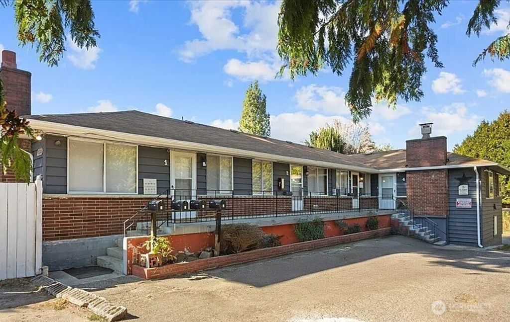 Photo of 1634 SW 114th Street, Seattle, WA 98146 (MLS # 2435077)