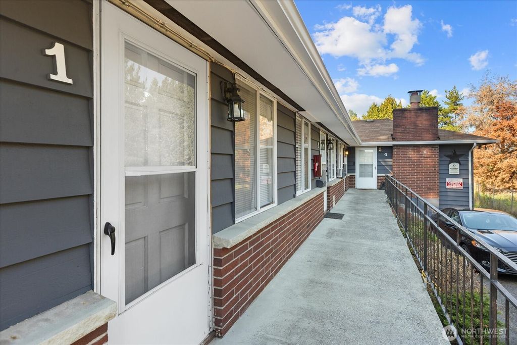 Photo of 1634 SW 114th Street, Seattle, WA 98146 (MLS # 2435077)