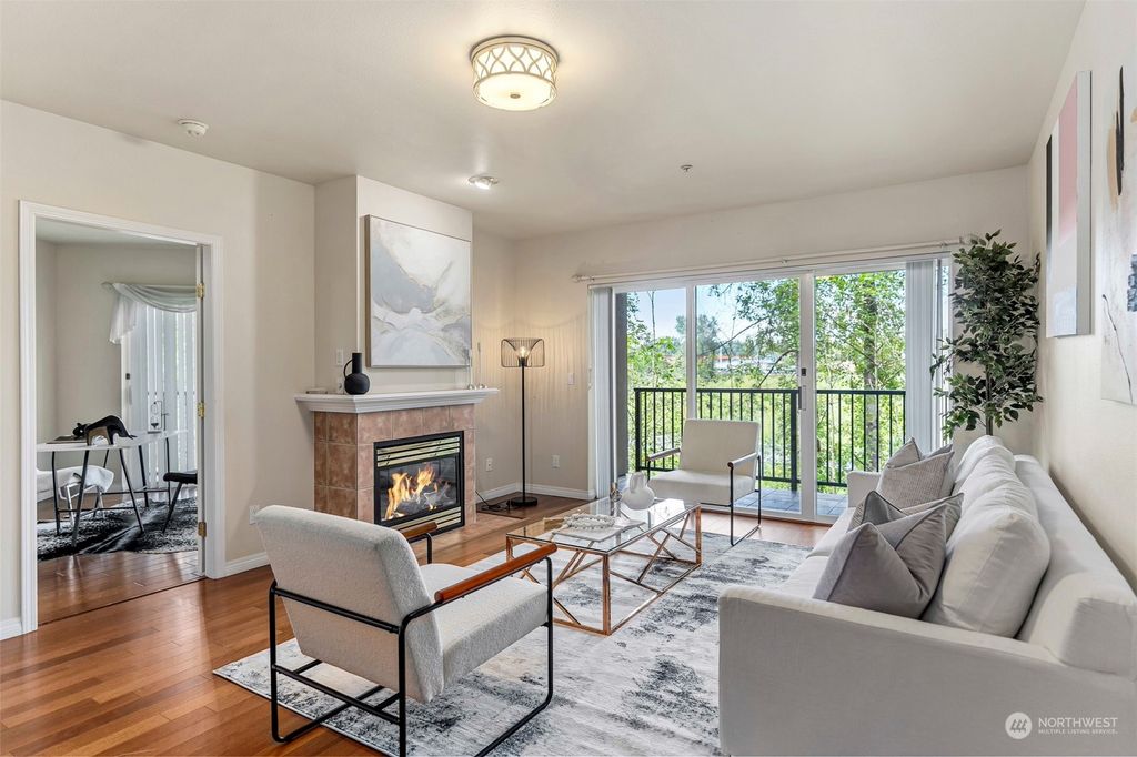 Photo of 12439 NE Totem Lake Way #103, Kirkland, WA 98034 (MLS # 2246804)