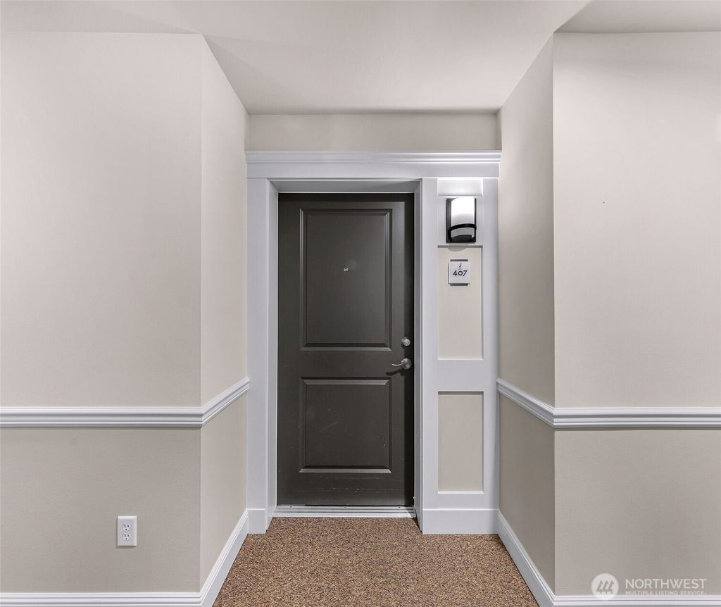 Photo of 3150 W Government Way #407, Seattle, WA 98199 (MLS # 2485473)