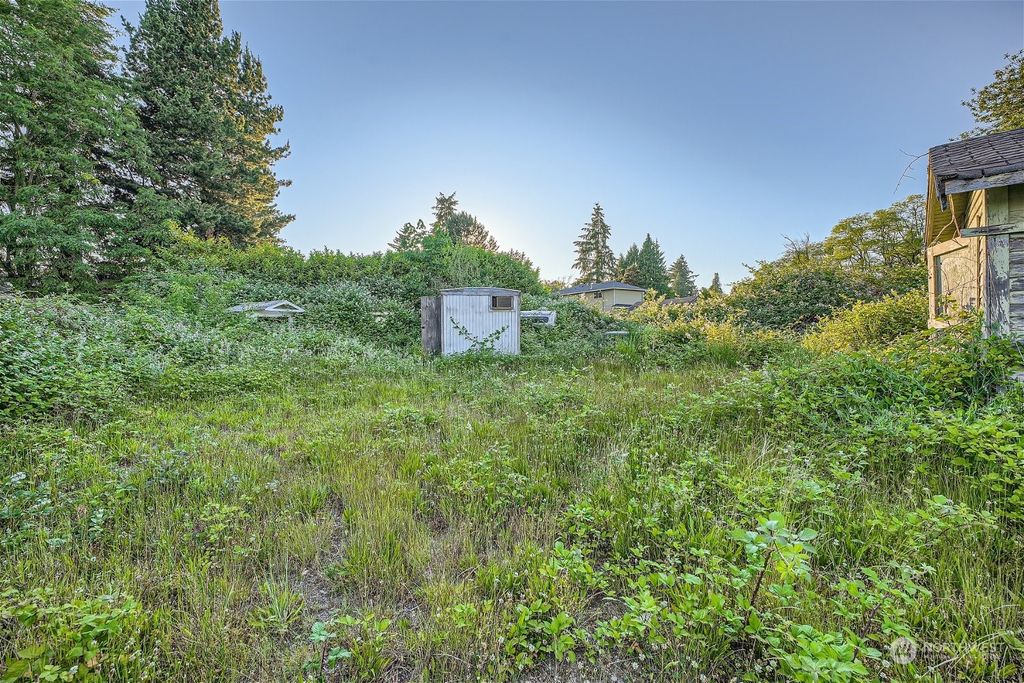 Photo of 12463 Des Moines Memorial Drive S, Seattle, WA 98168 (MLS # 2256107)