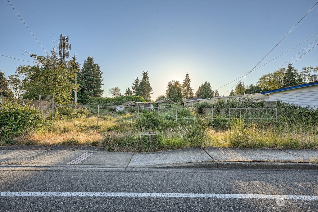 Photo of 12463 Des Moines Memorial Drive S, Seattle, WA 98168 (MLS # 2256107)