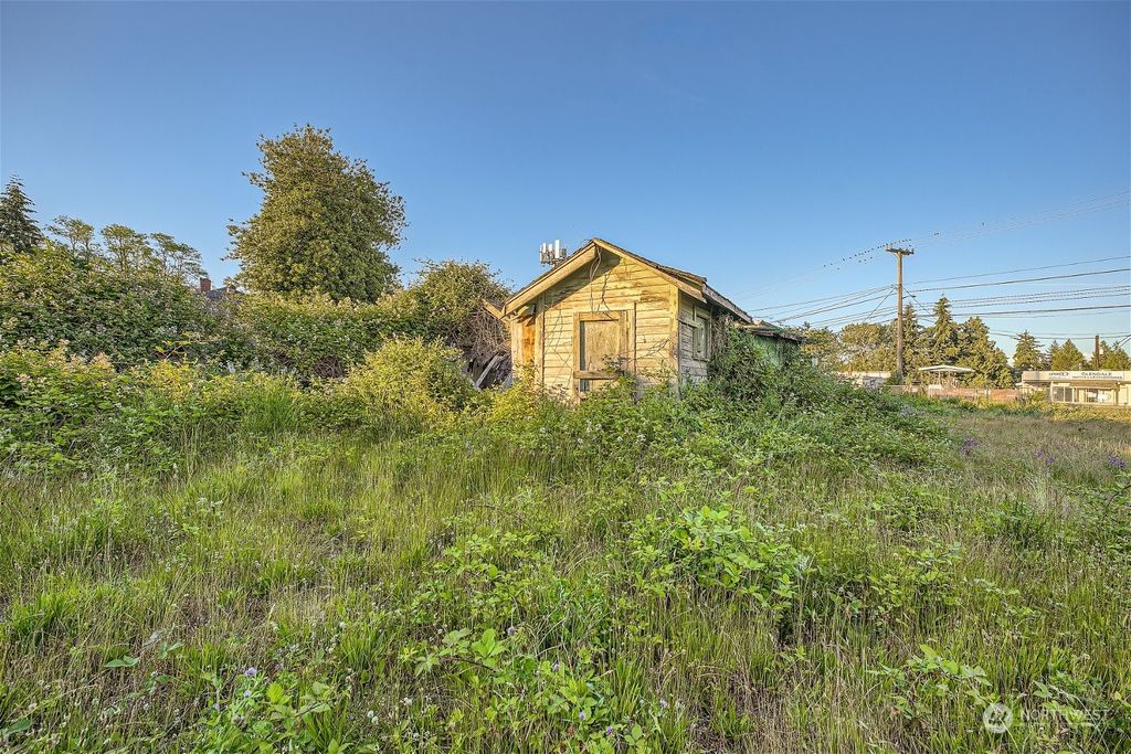 Photo of 12463 Des Moines Memorial Drive S, Seattle, WA 98168 (MLS # 2256107)