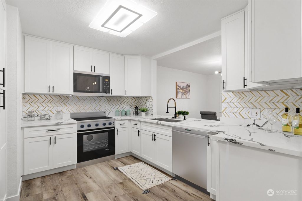 Photo of 14611 NE 51st Pl #F1, Bellevue, WA 98007 (MLS # 2178850)