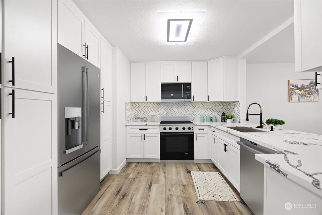 Photo of 14611 NE 51st Pl #F1, Bellevue, WA 98007 (MLS # 2178850)