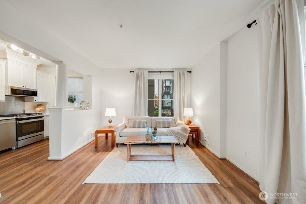 Photo of 10042 Main Street #203, Bellevue, WA 98004 (MLS # 2514516)