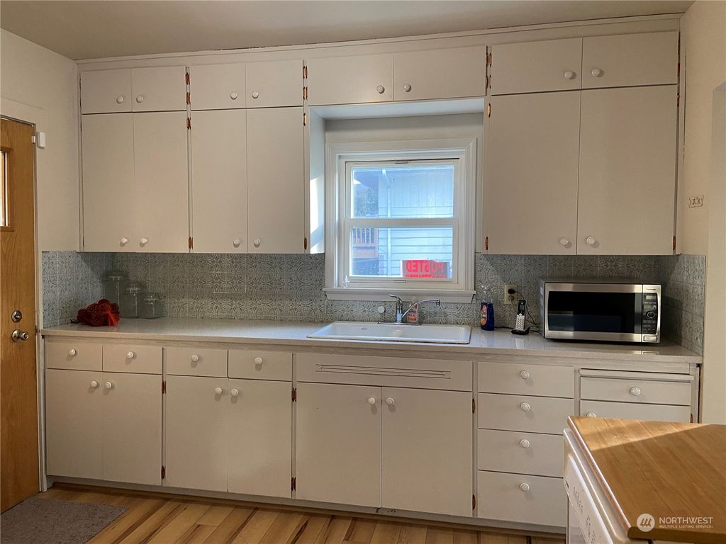 Photo of 12630 24th Avenue S, Seattle, WA 98168 (MLS # 2030369)