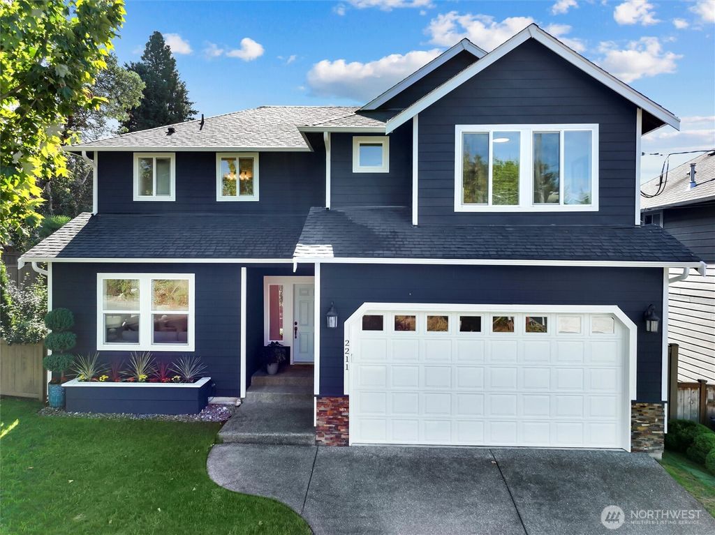Photo of 2211 SE 103rd Place, Seattle, WA 98146 (MLS # 2439392)