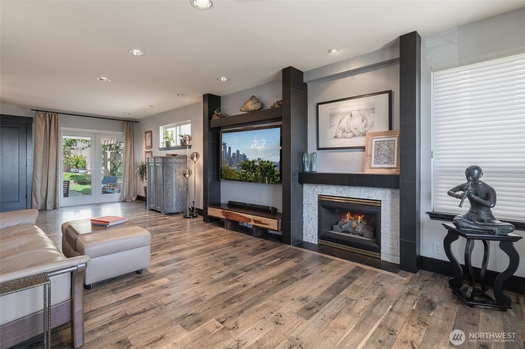 Photo of 3831 34th Avenue SW, Seattle, WA 98126 (MLS # 2371657)