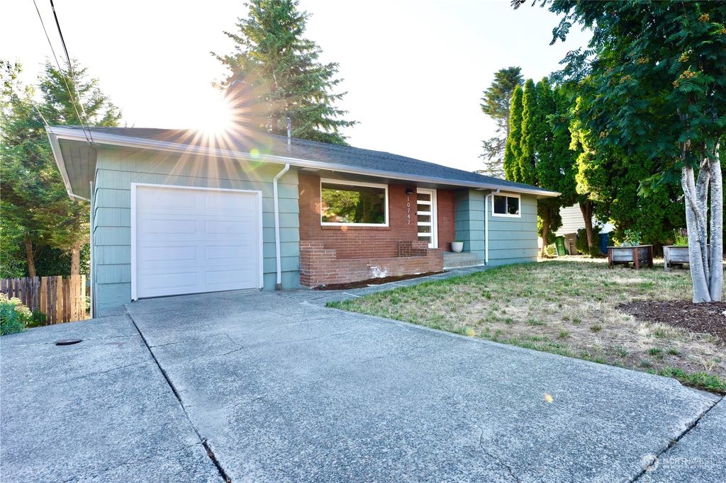 Photo of 10747 28th Avenue SW, Seattle, WA 98146 (MLS # 2132238)