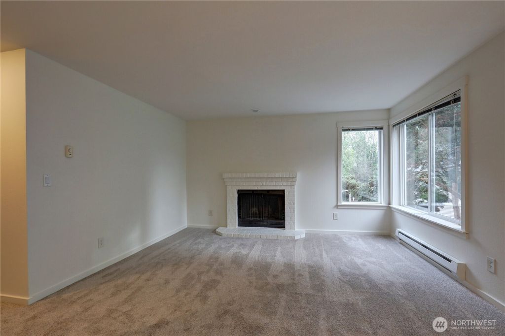 Photo of 11303 NE 128th St St #B201, Kirkland, WA 98034 (MLS # 2463896)