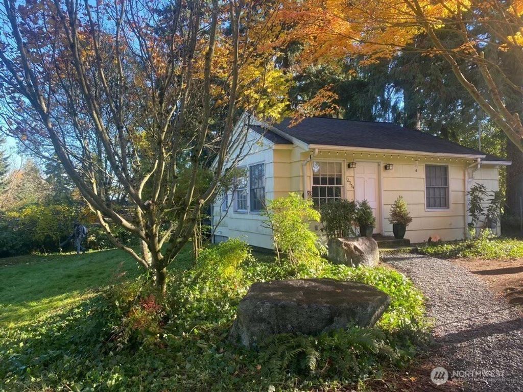 Photo of 12054 20 Avenue NE, Seattle, WA 98125 (MLS # 2336214)