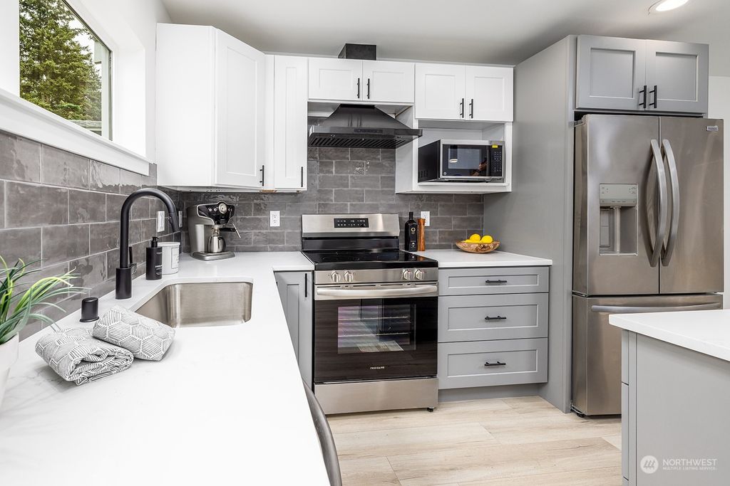 Photo of 12006 B Dayton Avenue N, Seattle, WA 98133 (MLS # 2245668)