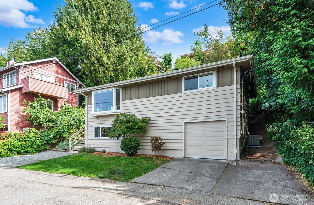 Photo of 5625 SW Teig Place, Seattle, WA 98116 (MLS # 2581958)