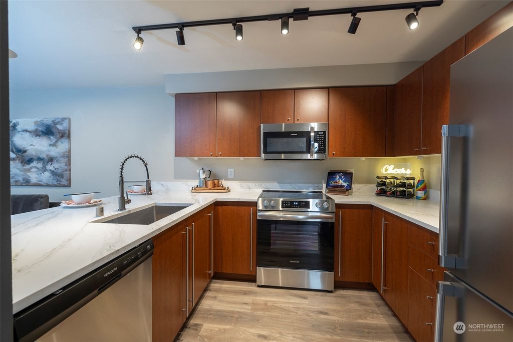 Photo of 11223 NE 128th Street #J-201, Kirkland, WA 98034 (MLS # 2267797)