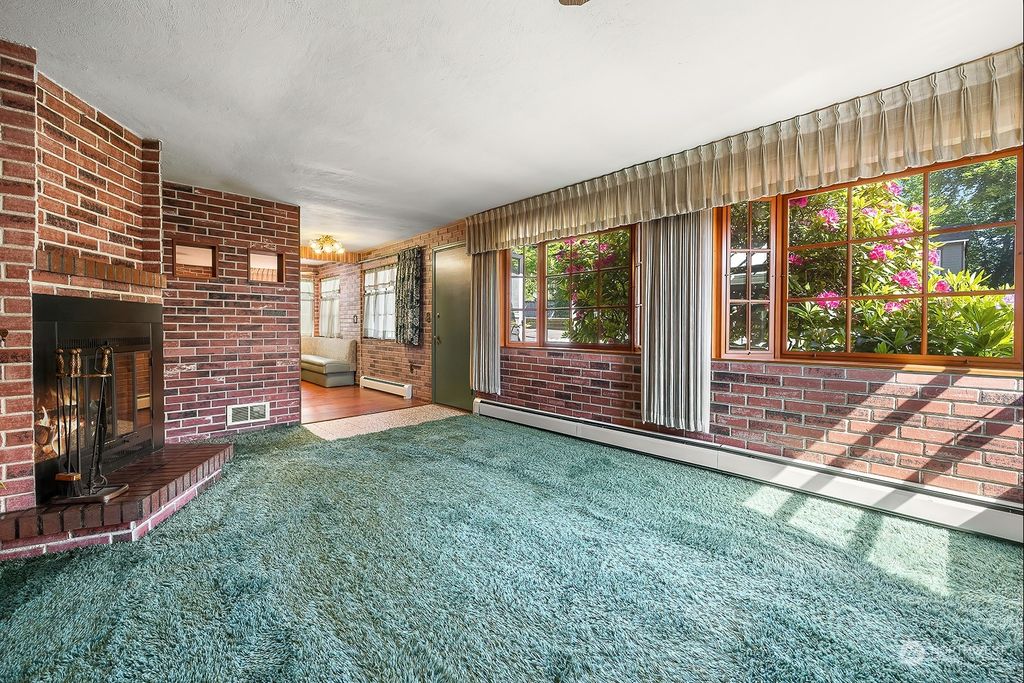 Photo of 1911 N 137th Street, Seattle, WA 98133 (MLS # 2245879)