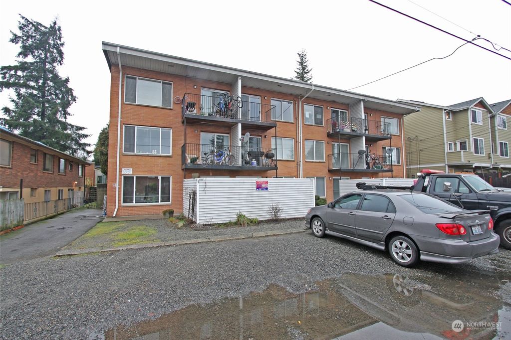 Photo of 12011 32nd Avenue NE, Seattle, WA 98125 (MLS # 2209110)
