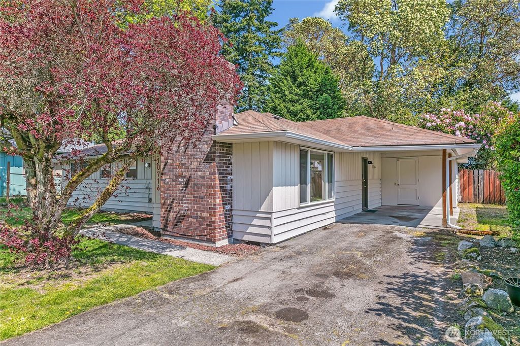 Photo of 10716 21st Avenue SW, Seattle, WA 98146 (MLS # 2361461)