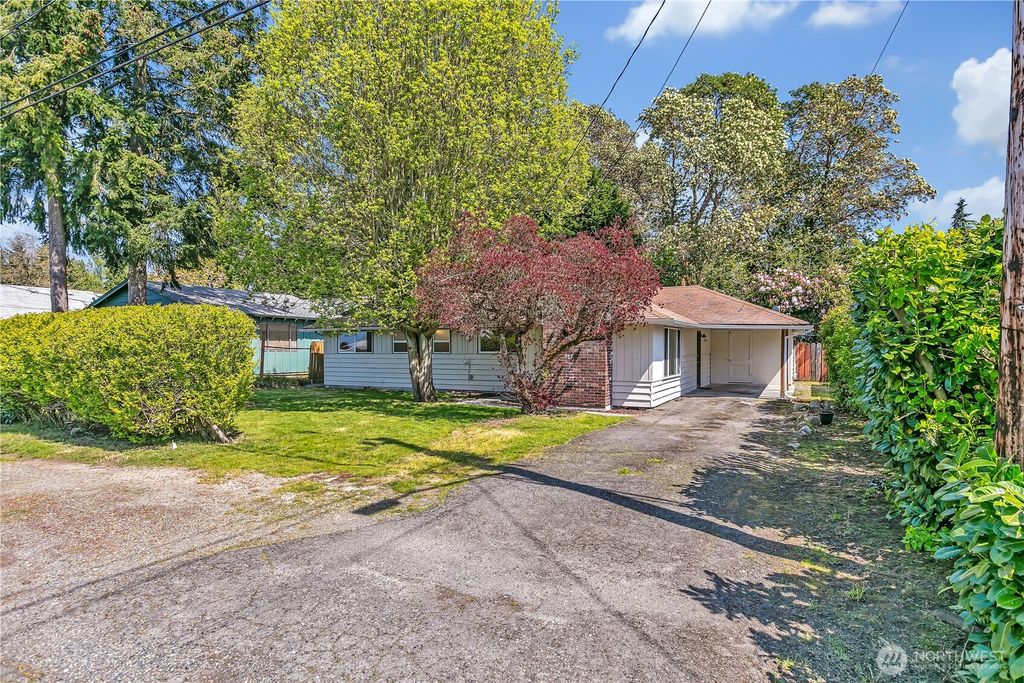 Photo of 10716 21st Avenue SW, Seattle, WA 98146 (MLS # 2361461)