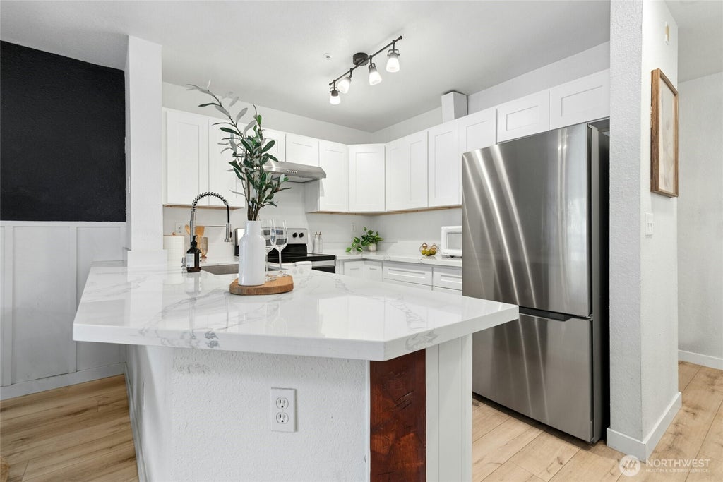 Photo of 17300 91st Avenue NE #B101, Bothell, WA 98011 (MLS # 2575424)